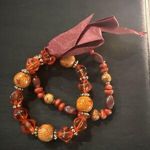 Two Orange & Red Beaded Expandable Bracelets